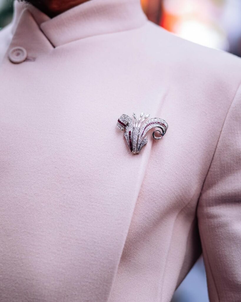 f1 movie premiere New York lewis Hamilton goat brooch