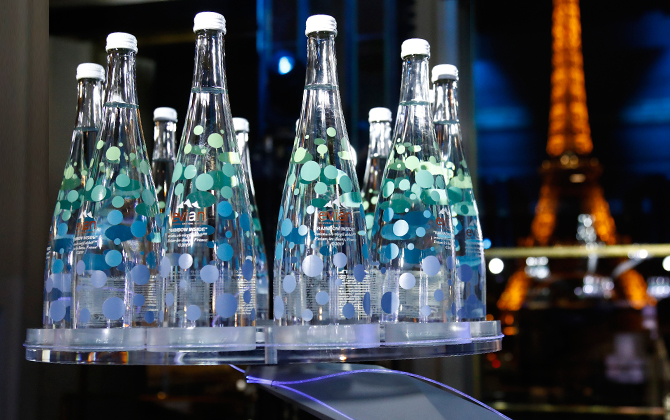 Louis Vuitton designer Virgil Abloh and Evian have teamed up to create  limited edition glass water bottles tied to the launch of a $54,000  sustainable design contest